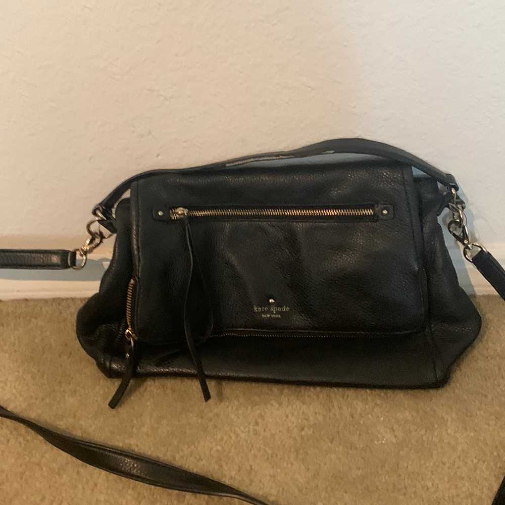 Black Kate Spade cross body with little wear on handles 9 by 13